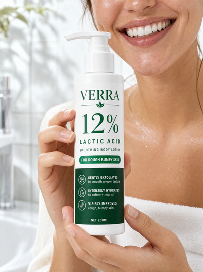 Woman holding the 200ml bottle in a bright bathroom